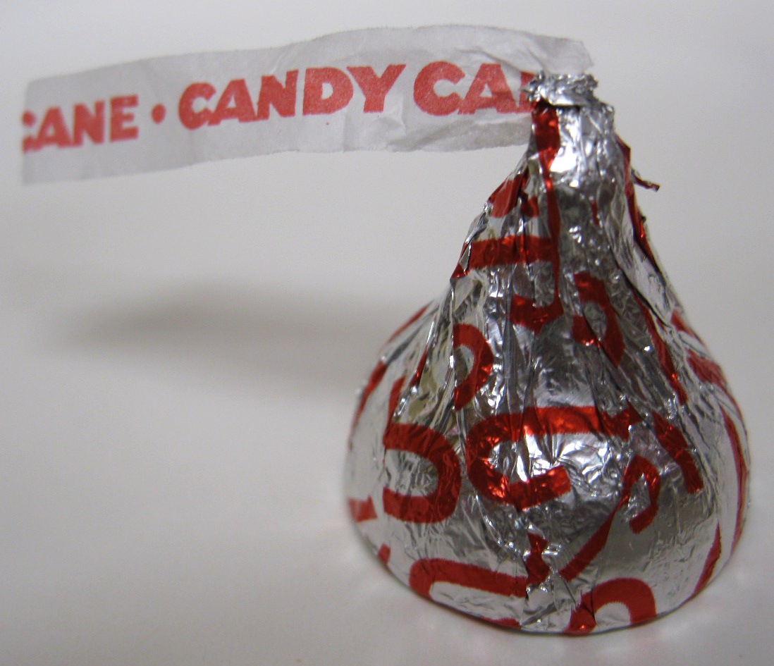 http://junkfoodbetty.com/wp-content/uploads/2011/12/Hersheys-Kisses-Candy-Cane-Flavored-Candies-Wrapper1.jpg